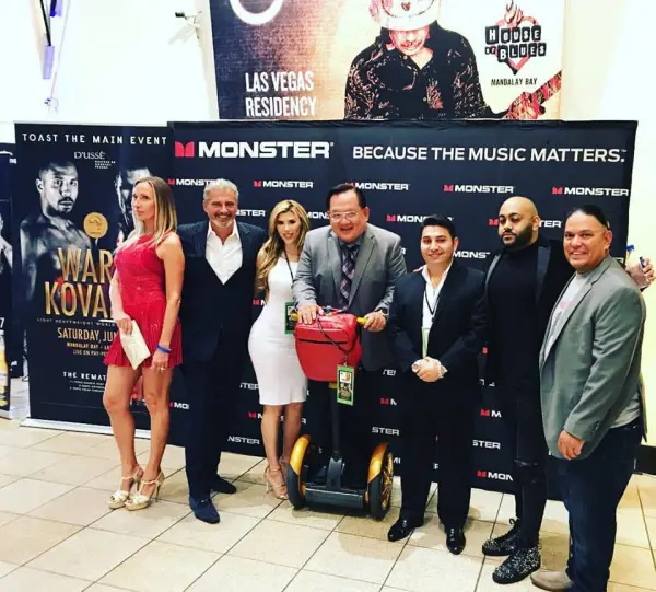 Monster Products CEO Noel Lee center with Fred Khalilian at company event